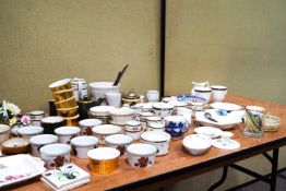 A collection of ceramics including ceramic flowers