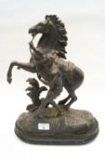 A cast metal Marly horse