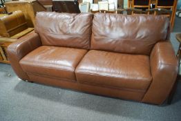 A leather three seat sofa