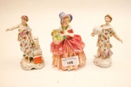 A Doulton figure and two others