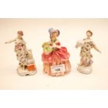 A Doulton figure and two others