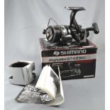 A Shimano 'Magnumlite GT-X2300' fixed spool reel in original box with spare spool