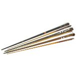 Three snooker cues,