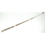 A Hardy fly fishing rod in three sections, stamped Hardy Bros, maker, Alnwick, numbered 5279,