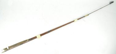 A Hardy fly fishing rod in three sections, stamped Hardy Bros, maker, Alnwick, numbered 5279,