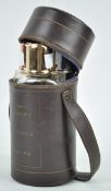 A leatherette carrying case containing three bottles of Spirits,