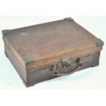 A leather and brass bound attache style cartridge case,