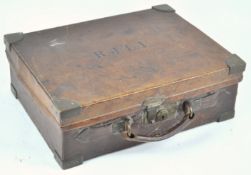 A leather and brass bound attache style cartridge case,