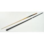 A one piece cue in a Japanned case