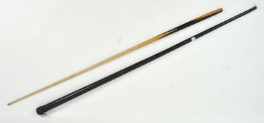 A one piece cue in a Japanned case