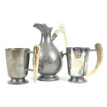 Two silver plated mugs with antler handles, 13cm high,