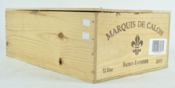 Twelve bottles of Marquis de Calon 2001,