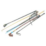 A collection of six assorted riding crops, with one vintage example,