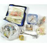 A bag of sea fishing terminal tackle, rig wallets, hooks, booms, swirls,