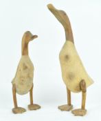 Two wooden figures of runner ducks,