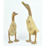 Two wooden figures of runner ducks,