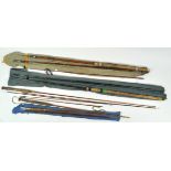 A collection of split cane and vintage fishing rods