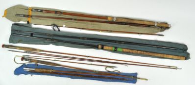 A collection of split cane and vintage fishing rods
