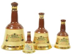 A Wade Bells whisky decanter 75.7cl, with three other sizes 37.8cl, 18.