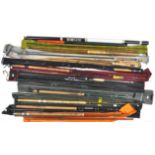 A group of coarse and fly fishing rods in bags