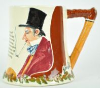 A Crown Devon pottery 'John Peel' mug with musical movement to the base, 11.