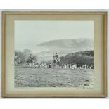 A vintage photograph of the Devon and Somerset Stag Hounds, titled and signed to the mount,