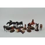 Two boxes of equine figures