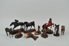 Two boxes of equine figures