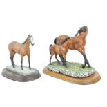 A Leonardo Galleries resin figure of a mare and foal, 23cm high,