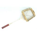 A Slazenger 'Flight Commander' badminton racquet, with Dunlop press,