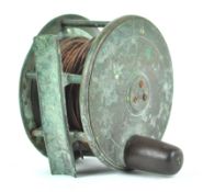 A brass fishing reel,