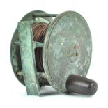 A brass fishing reel,