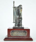 A silver plated golfing trophy, in the form of a golf bag with removable umbrella,