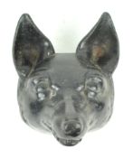 A cast iron stirrup cup style fox's mask sculpture,