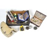 A box of fly fishing equipment,