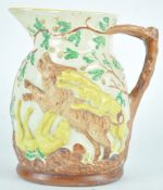 A Mason's pottery jug, moulded with a Stag hunting scene, printed marks, 18.5cm high