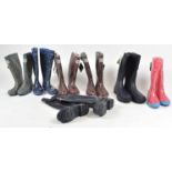 A group of assorted decorated Wellington boots in various sizes