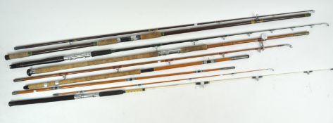 A group of five glass sea fishing rods