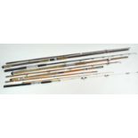 A group of five glass sea fishing rods