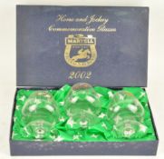 A boxed gift set of three horse and jockey commemorative brandy glasses,