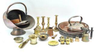 A selection of brass and copper, to include a pair of brass candlesticks,