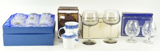 Assorted glasses and Chinese tea mugs