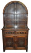 An oak domed top dresser,