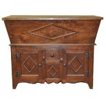 A hardwood dough bin style side cupboard with lidded top over two doors and a drawer,