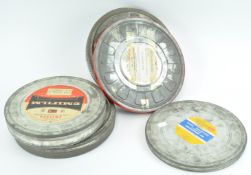 A group of empty aluminium film canisters