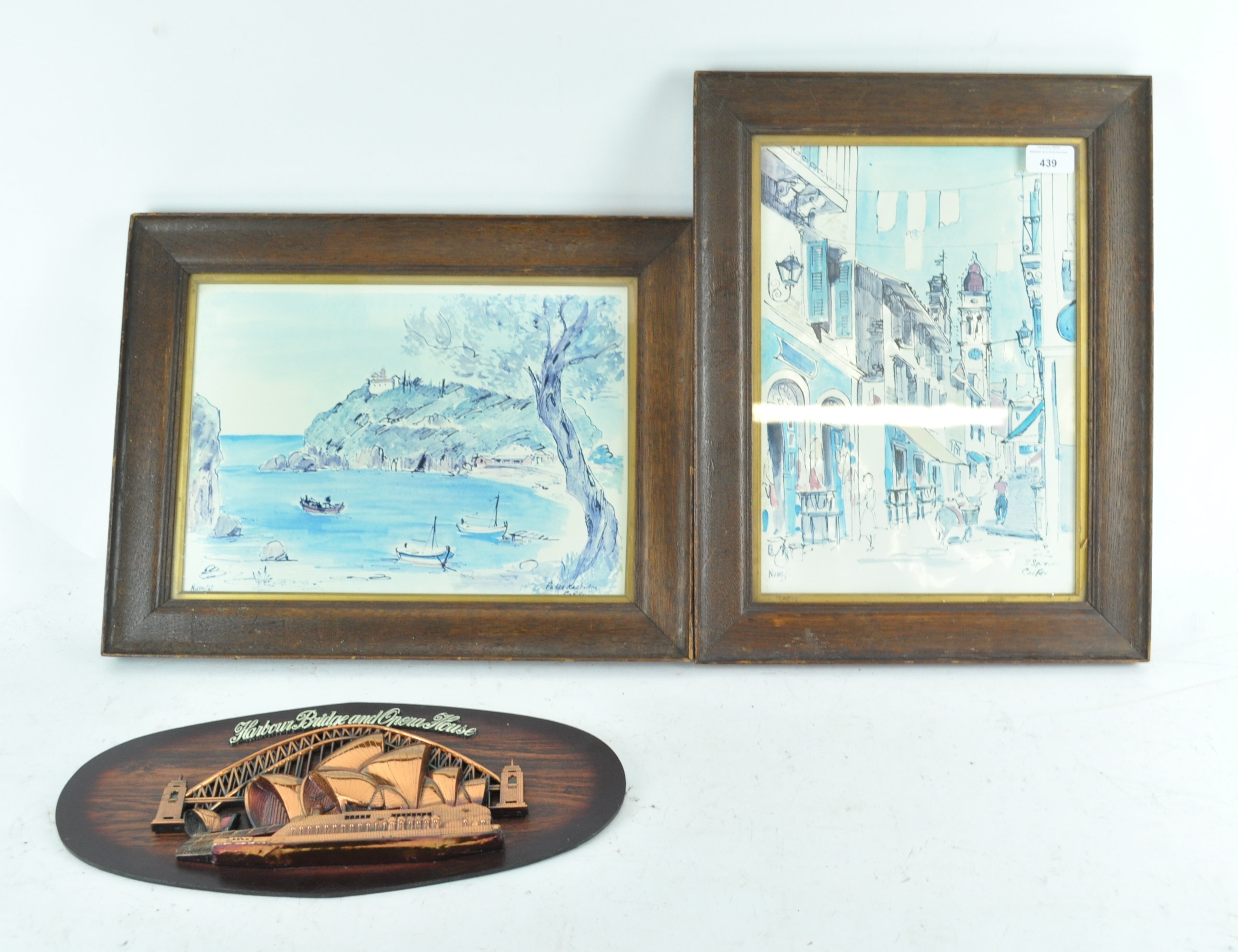 A pair of pictures and an Australian plaque