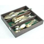 A box containing silver plated cutlery