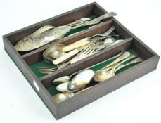 A box containing silver plated cutlery