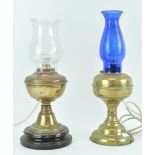 Two brass oil lamps, converted to electricity,