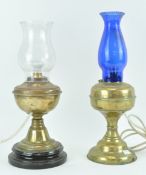 Two brass oil lamps, converted to electricity,